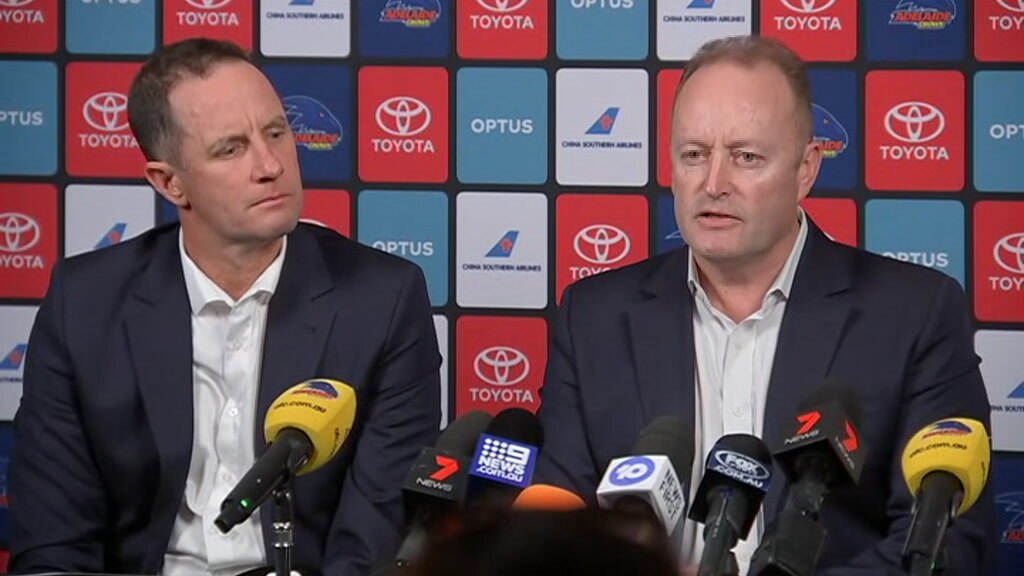 Don Pyke sitting next to Rob Chapman with microphones in front of them