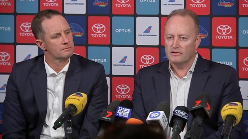 Don Pyke sitting next to Rob Chapman with microphones in front of them