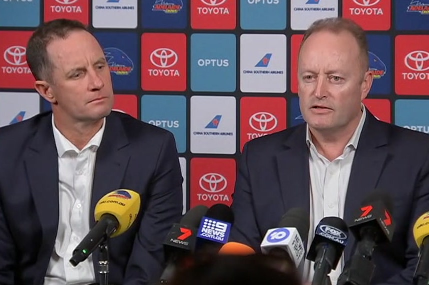 Don Pyke sitting next to Rob Chapman with microphones in front of them