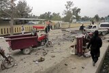 Street with tipped over truck and debris spread across it