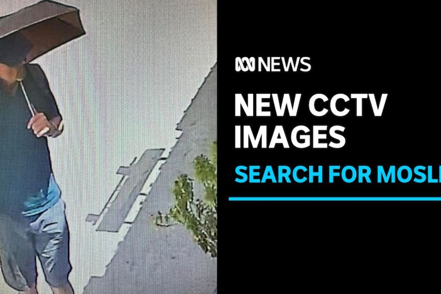 New CCTV Images, Search for Mosley: CCTV image of a man walking, holding an umbrella.