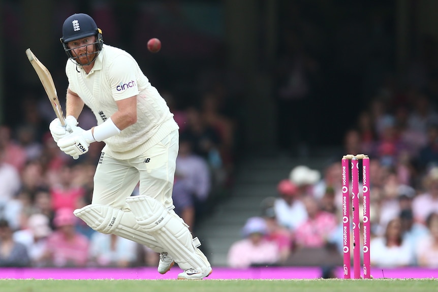 England batter Jonny Bairstow looks at the cricket ball as it bounces away after a shot in an Ashes Test against Australia.