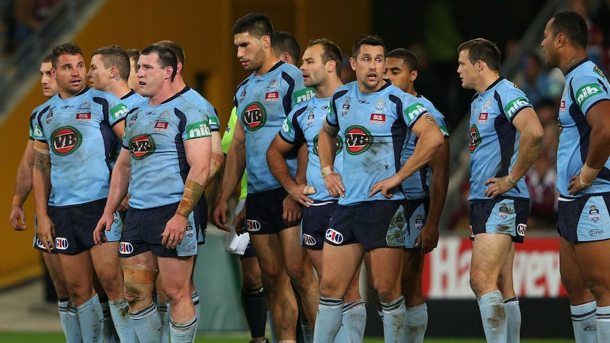 NSW players stand around dejected