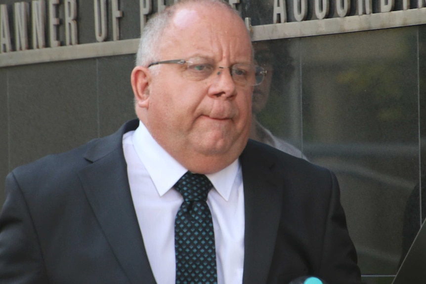 A tight head and shoulders shot of prosecutor James Mactaggart outside the Perth Supreme Court.