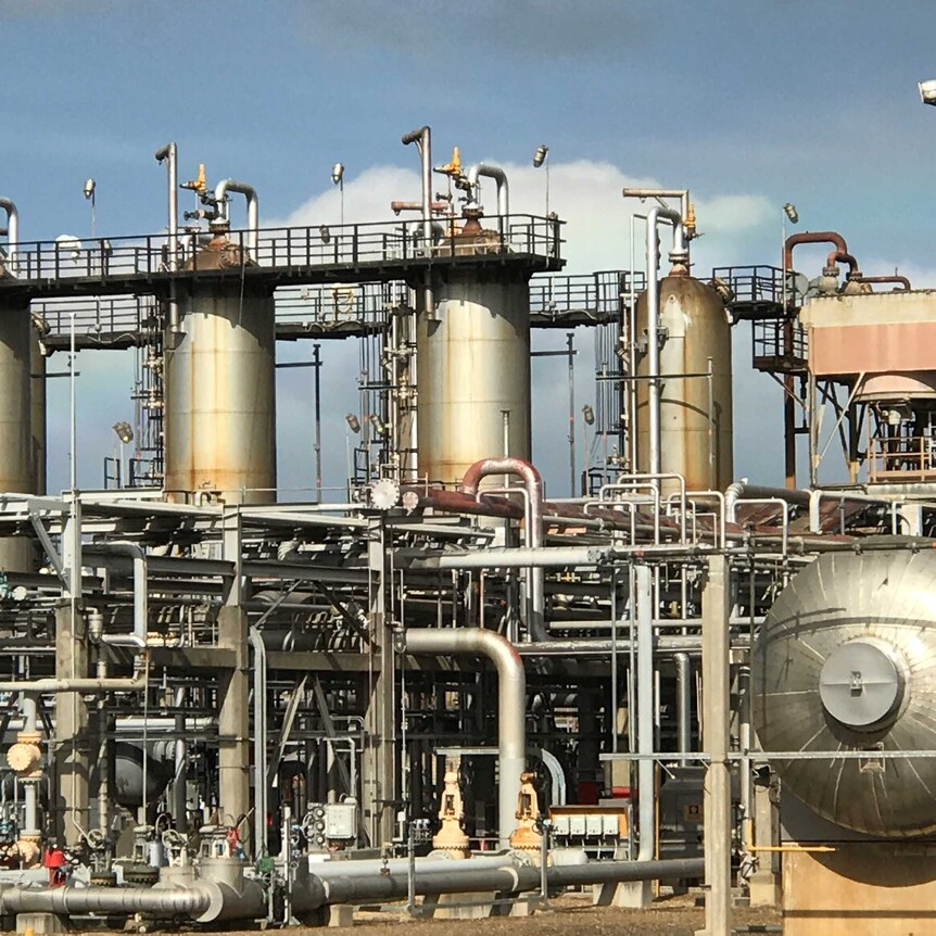 Silver and gold pipes of different shapes and sizes intertwine at the Longford gas plant in Victoria.