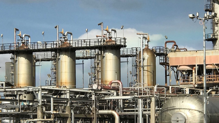 Silver and gold pipes of different shapes and sizes intertwine at the Longford gas plant