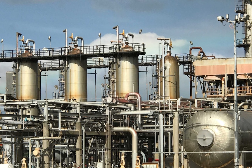 Silver and gold pipes of different shapes and sizes intertwine at the Longford gas plant