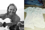 A black and white photo of a man with a guitar and a white shirt with blood stains