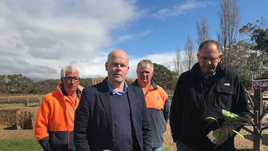 Labor's Shane Broad with fruit growers.
