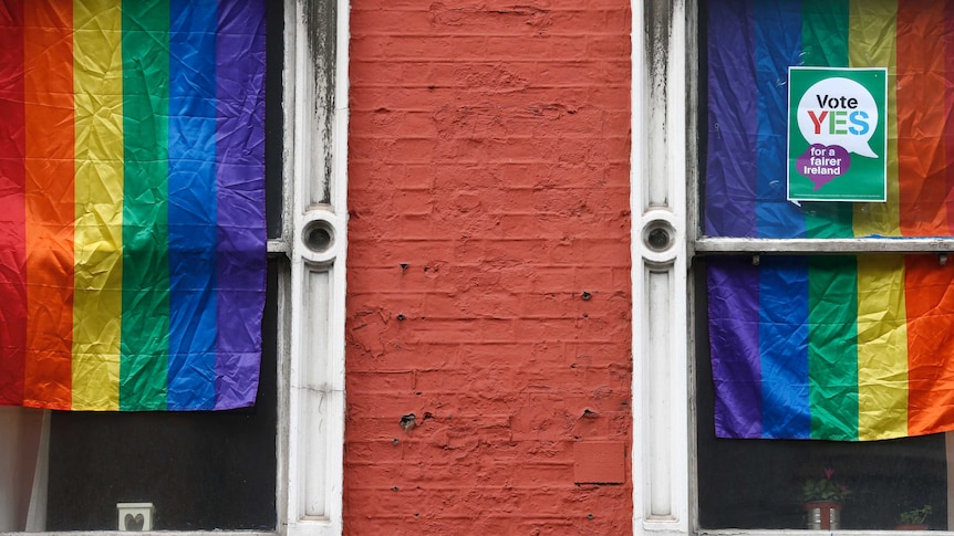 Gay pride flags in windows of Dublin building