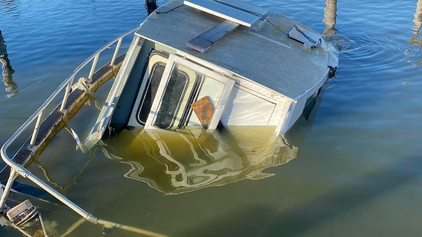A semi-sunken boat.