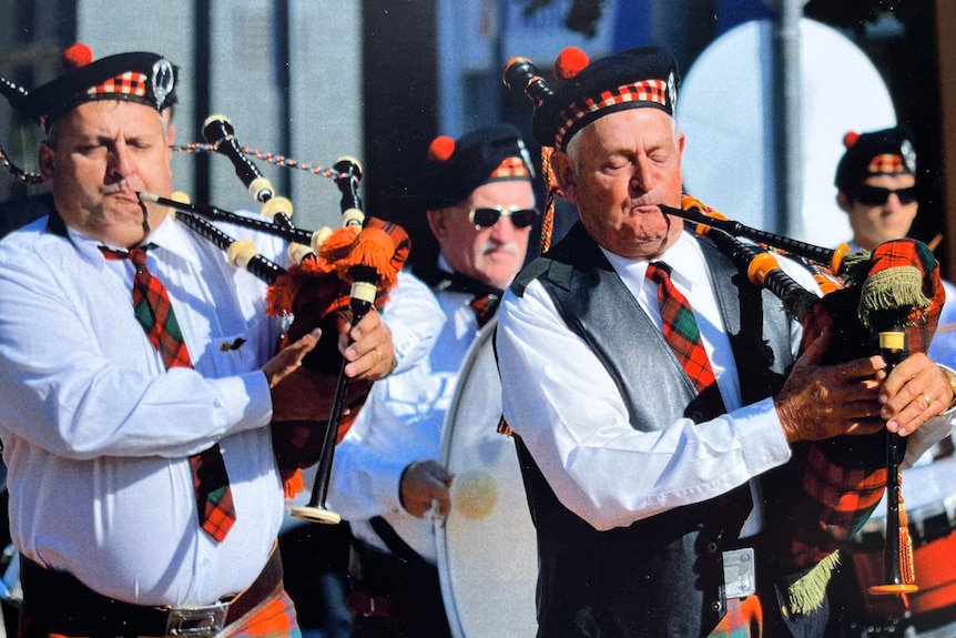 Man plays bagpipes