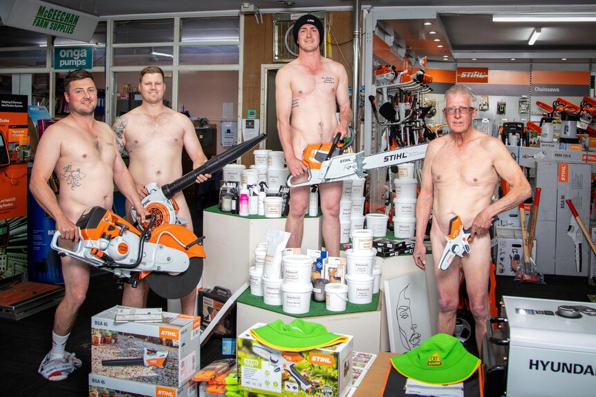 Four naked men with strategically held power tools stand in a hardware store.