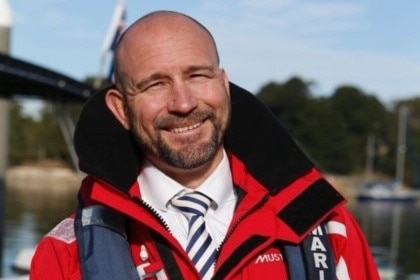 A man in maritime safety equipment