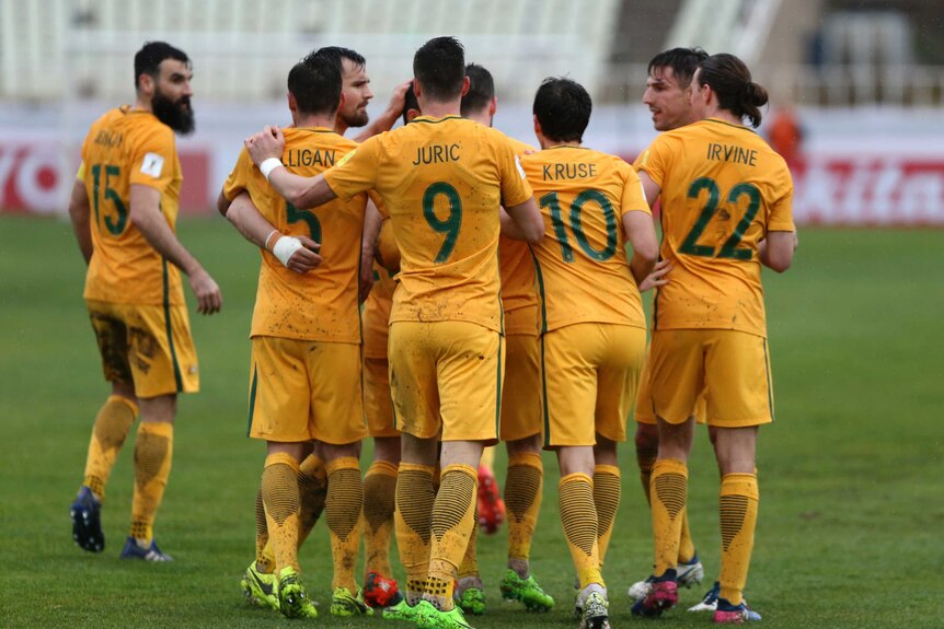 Socceroos celebrate Matt Leckie's goal against Iraq