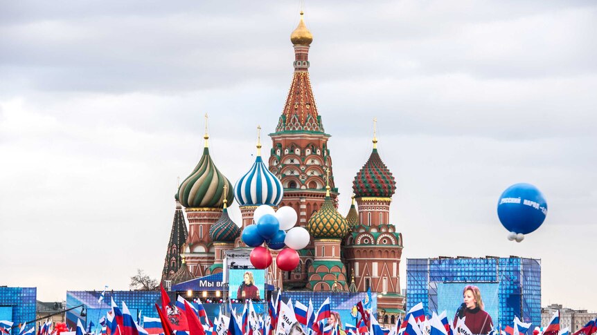 Pro-Kremlin activists rally at the Red Square in Moscow to celebrate the incorporation of Crimea into the country.