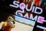 The Netflix series Squid Game is played on a mobile phone in this picture illustration
