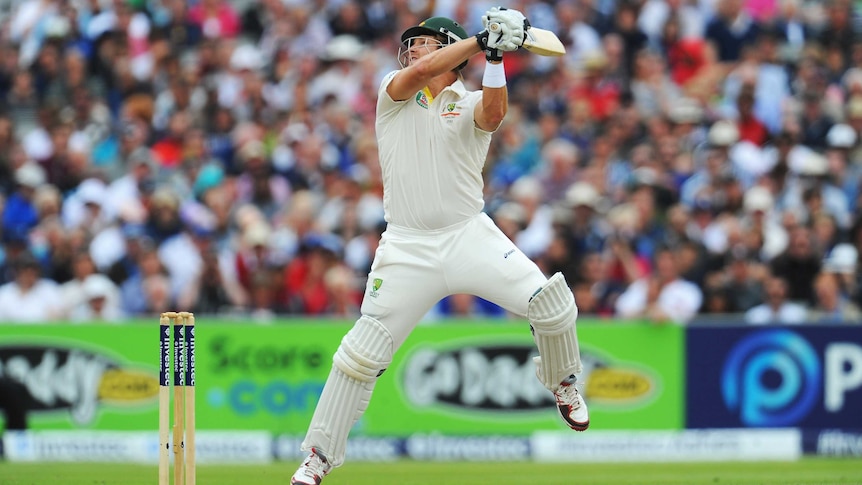Australia's Shane Watson gets out to a delivery from Tim Bresnan
