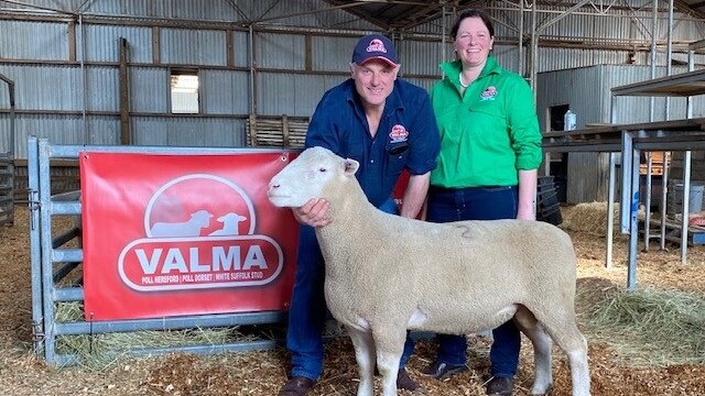 The proud breeders of a record breaking ram