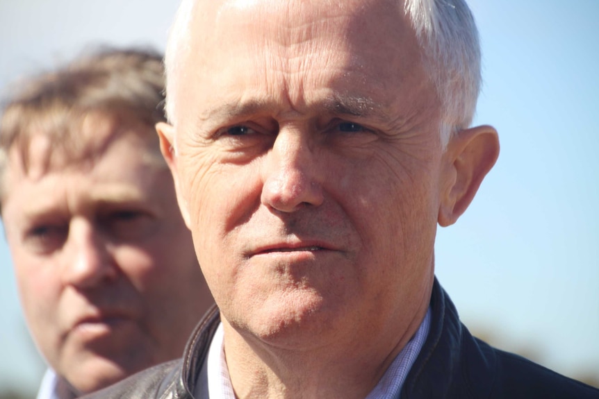 A tight head shot of Prime Minister Malcolm Turnbull outdoors.