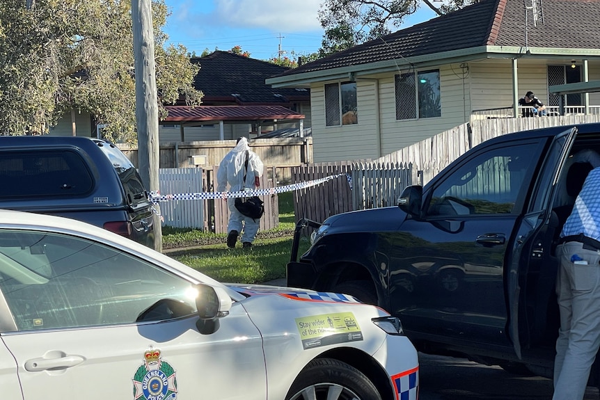 police entering a house