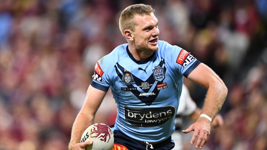 NSW Blues Tom Trbojevic stands up after scoring a State of Origin try.