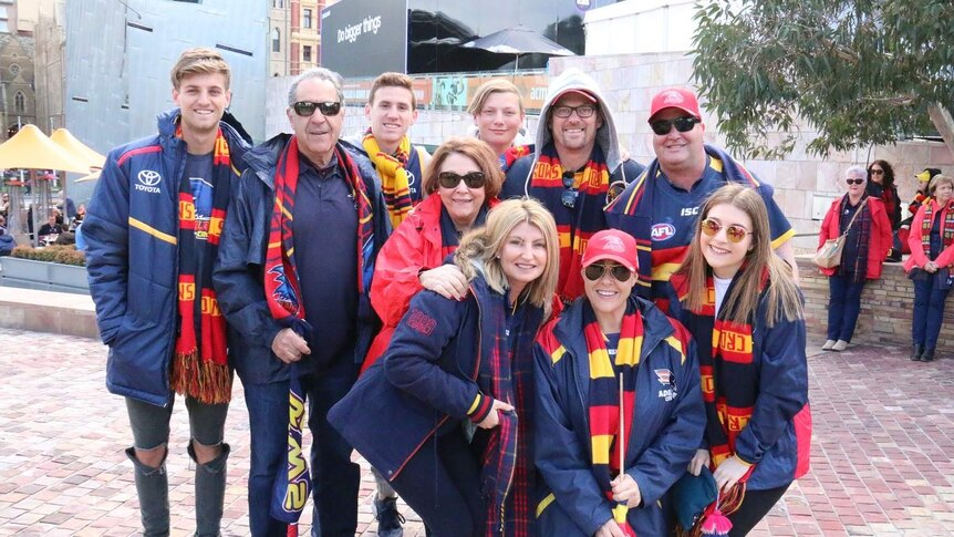Crows fans in their team colours in Federation Square.