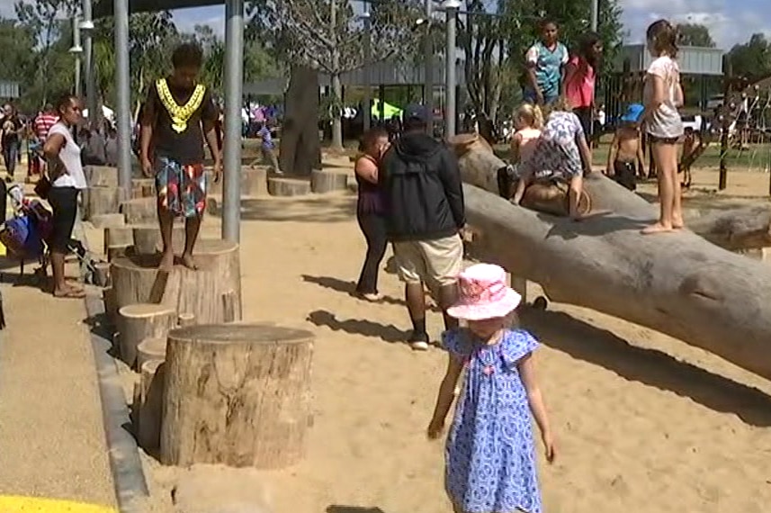 Children playing in a sandpit at the Kershaw Gardens playground on the day it opened in August 2018.