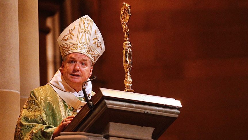 Archbishop Anthony Fisher speaks at a lectern