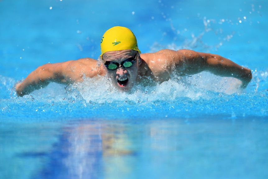 Clyde Lewis seen mid-butterfly during 400m individual medley.