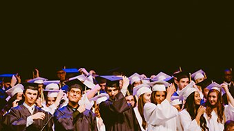 University graduates in academic dress.