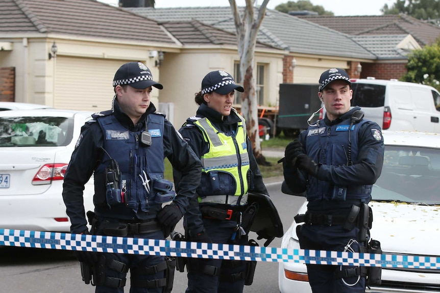 Police at the home of Yacqub Khayre, the man behind a fatal siege in Brighton.