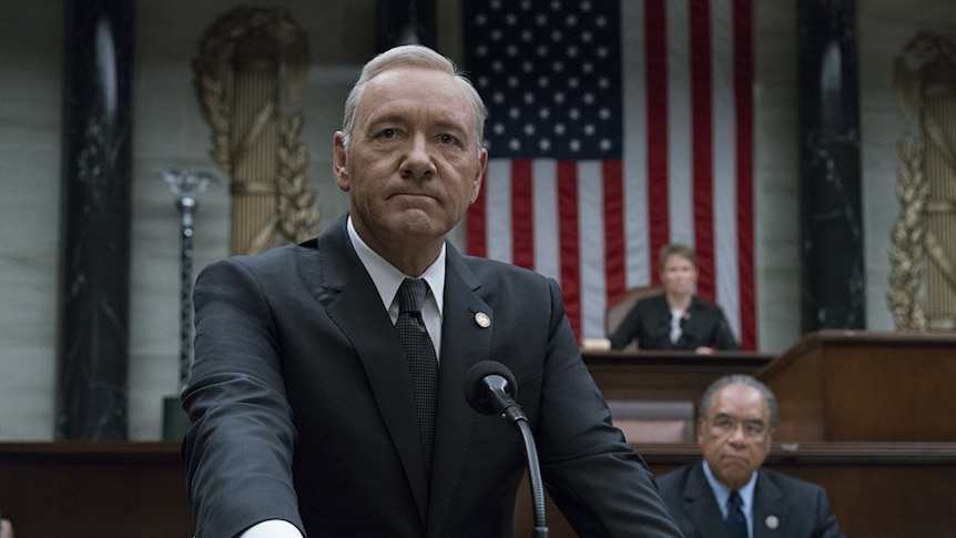 Frank Underwood stands at a podium in House of Cards