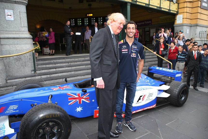 Australian Formula 1 driver Daniel Ricciardo with Melbourne Grand Prix Chairman Ron Walker.