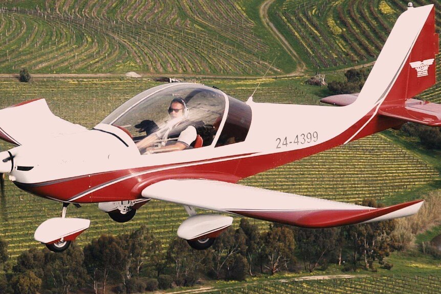 Tim Whitrow flying in his light plane