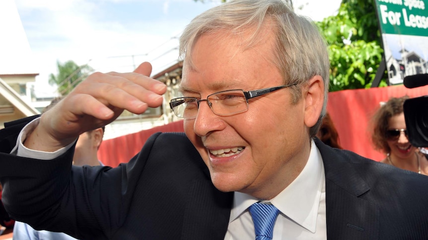 Kevin Rudd leaves a church service in Brisbane