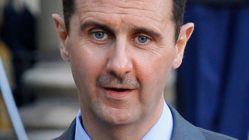 Syria's President Bashar al-Assad speaks after a meeting at the Elysee Palace in Paris in this December 9, 2010 file photo.