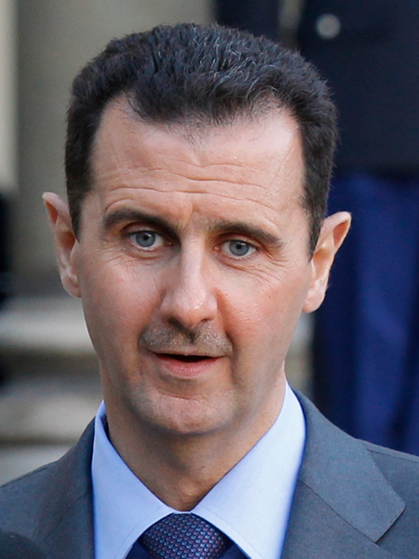 Syria's President Bashar al-Assad speaks after a meeting at the Elysee Palace in Paris in this December 9, 2010 file photo.