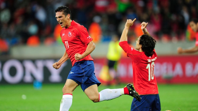 Mark Gonzalez's goal sealed the win for Chile in a game dominated by a card-happy referee.