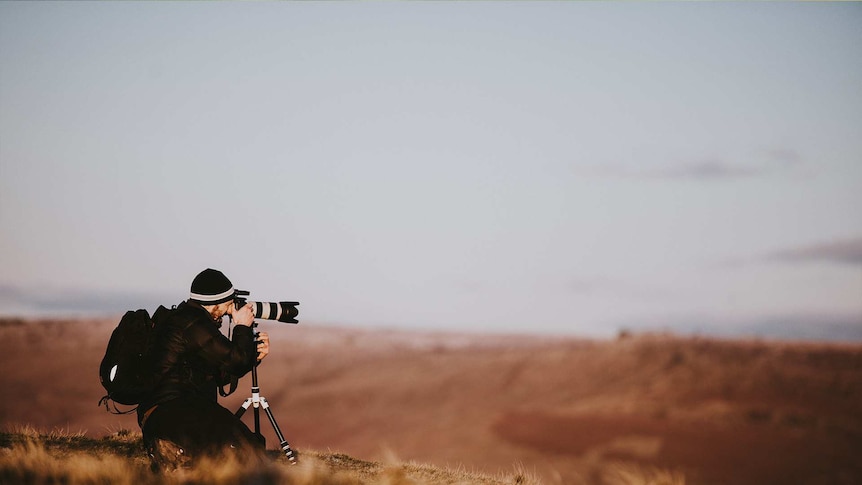 Photographer out in the wilderness for a story about finding a career that matches your personality