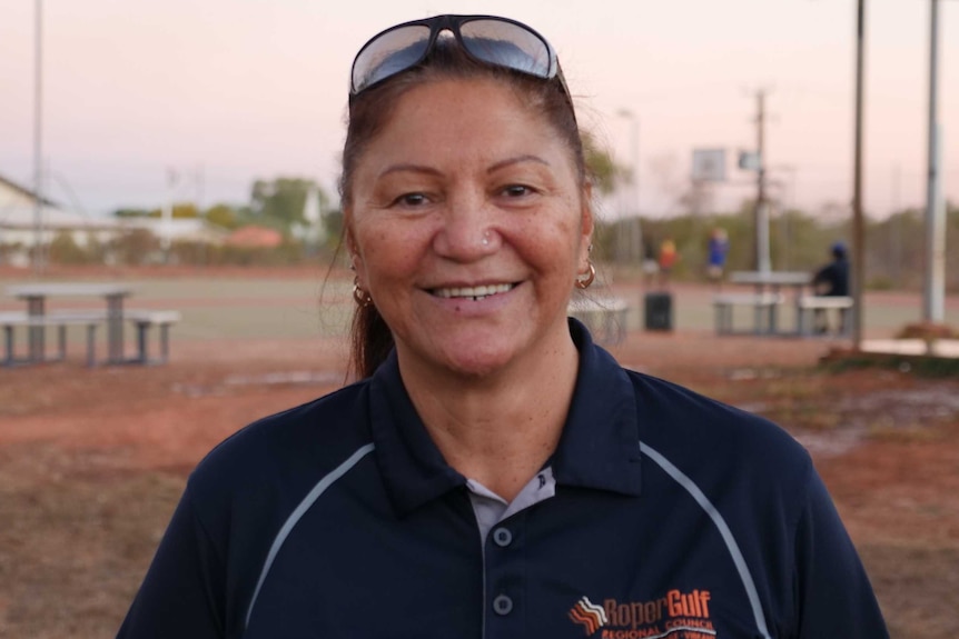 Bertha Cockran is standing at the basketball courts in Borroloola.