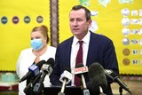WA Premier Mark McGowan at a media conference in front of Education Minister Sue Ellery.
