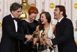 Cheers: Oscar winners Daniel Day-Lewis, Tilda Swinton, Marion Cotillard and Javier Bardem.