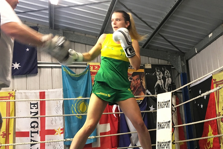 Female boxer Skye Nicolson in a training session in a boxing ring at Yatala.