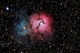 An image of the Trifid Nebula.