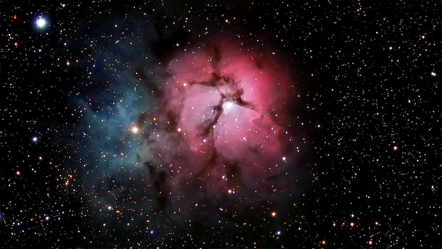 An image of the Trifid Nebula.