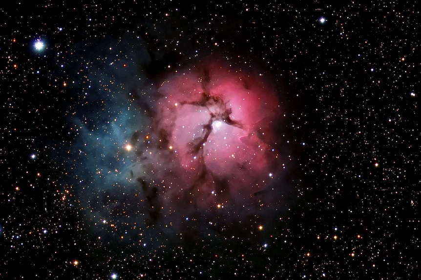 An image of the Triffid Nebula.