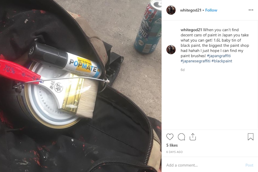 A screenshot of an Instagram post of paintbrushes and paint cans