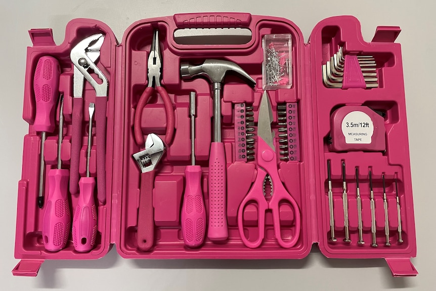 A pink 40 piece toolkit with screwdrivers, hammers, etc.