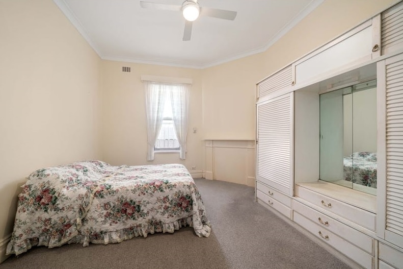 A dated bedroom inside the multi-million dollar recently sold Bondi semi.